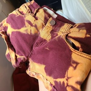 red / orange jean shorts